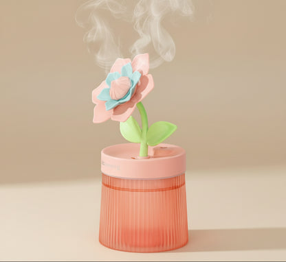 Cute gardenia plant humidifier with cool mist and 7-color night light. Quiet 260ml USB desktop humidifier for houseplants and rooms.