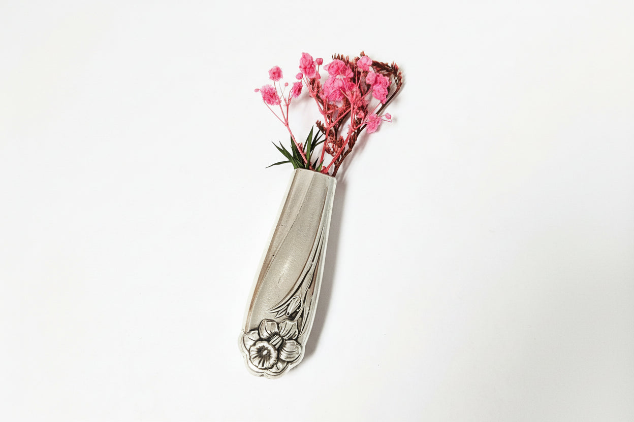 Antique silverware magnetic bud vase that sticks to fridges and metal surfaces. Holds water, one-of-a-kind vintage gift decor.