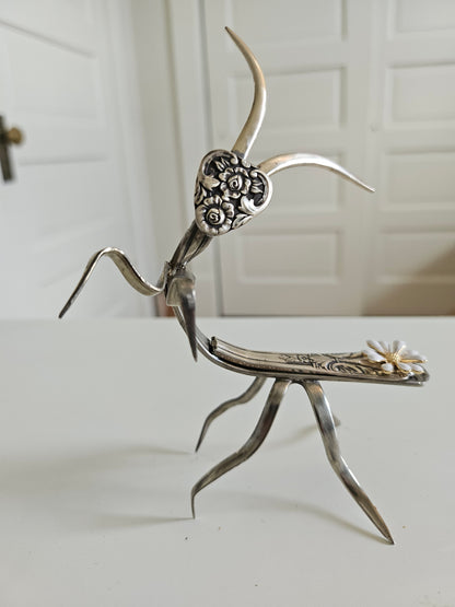 Handcrafted 5&quot; x 4&quot; praying mantis sculpture made from vintage silverware. Unique, whimsical art with gemstone accents and aged patina for mindful décor.