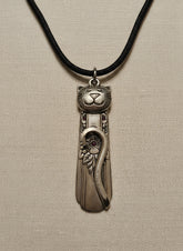 Handmade silver cat pendant necklaces from vintage silverware. Elegant, whimsical, and adjustable on a satin cord. Sustainably crafted and one-of-a-kind.