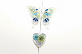 Handmade butterfly suncatchers with real pressed flowers and crystal chain. Reflects sunlight into rainbows—perfect for windows or near plants.