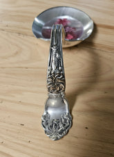 Handcrafted vintage silverware ladle trinket holder with resin and dried flowers. Perfect for rings, jewelry, and décor. Whimsical, cottagecore, one-of-a-kind.