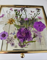 Floral mirrored keepsake and jewelry box with real pressed flowers. A 5" botanical glass box by artist Angel Singh, blending elegant storage with preserved floral art.