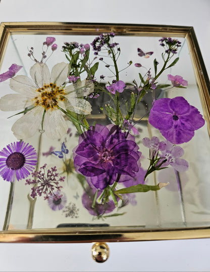 Floral mirrored keepsake and jewelry box with real pressed flowers. A 5" botanical glass box by artist Angel Singh, blending elegant storage with preserved floral art.