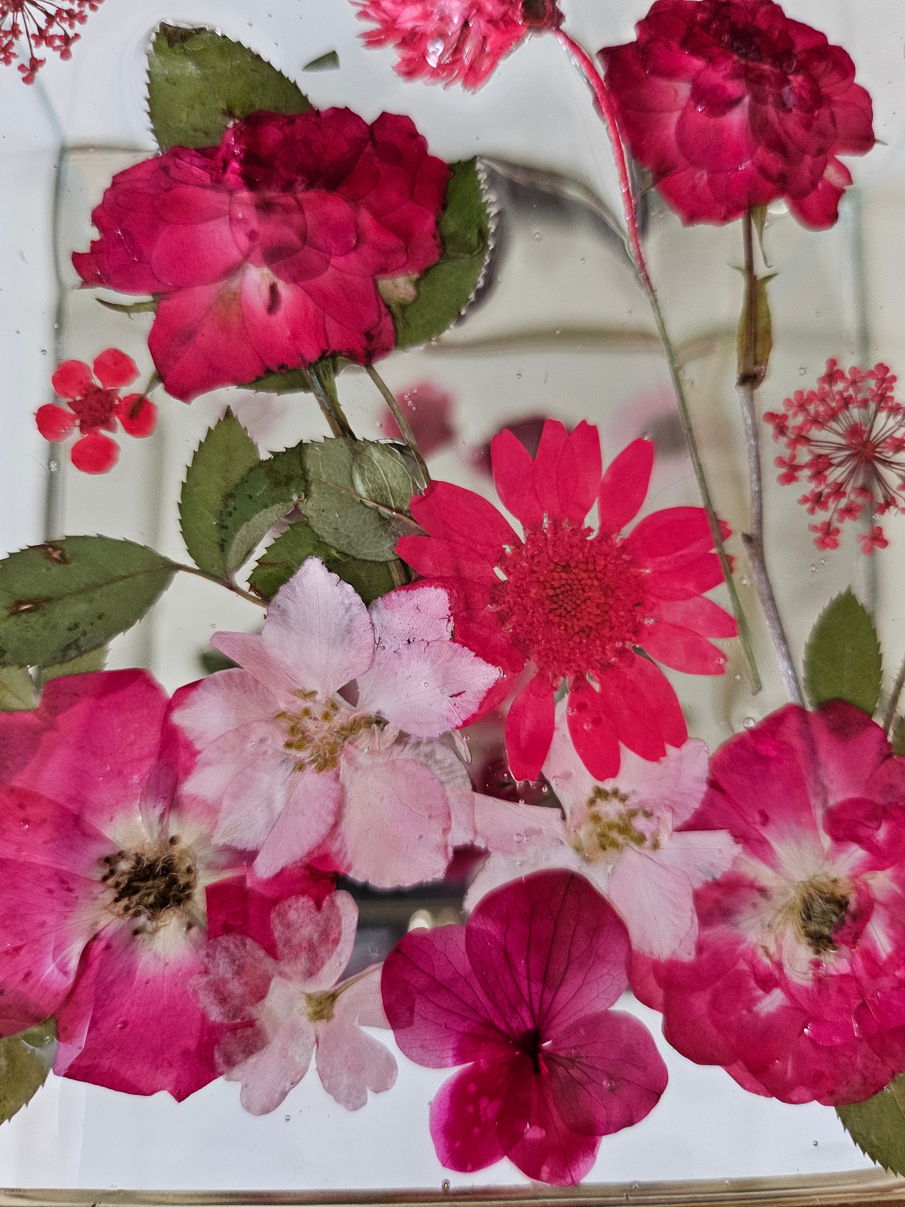Floral mirrored keepsake and jewelry box with real pressed flowers. A 5" botanical glass box by artist Angel Singh, blending elegant storage with preserved floral art.