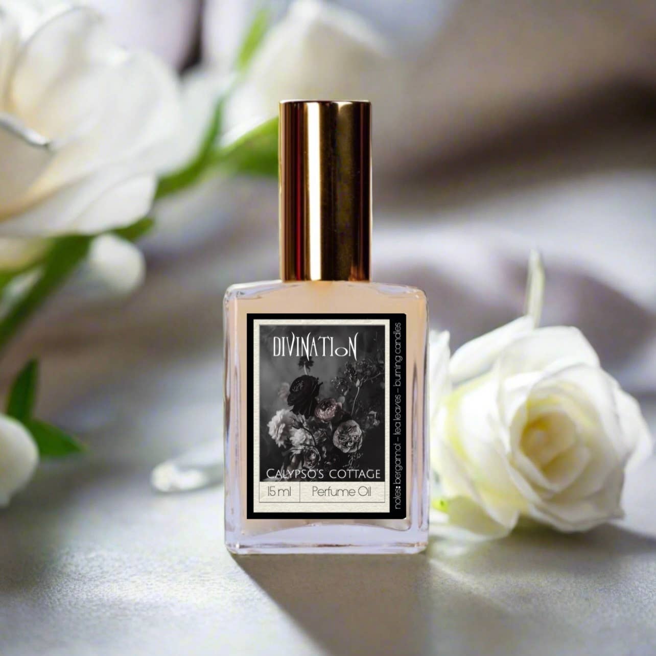 Divination Perfume Oil with bergamot, tea leaves &amp; candle smoke. Infused with gemstones in jojoba oil. Vegan, organic &amp; cruelty-free ritual scent.