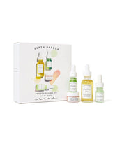 A soothing Earth Harbor mini skincare set featuring cleanser, serums, and repair balm to calm, hydrate, and renew stressed skin with customizable botanical rituals.