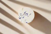 Aromatherapy shower steamer with essential oils. Biodegradable, handmade, and ultra-scented for a spa-like experience. Not for use as a bath bomb.