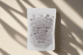 Handcrafted 5 oz botanical bath salts in heat-sealed pouches. Plant-based, aromatic blends with essential oils & florals for a calming, skin-softening soak.