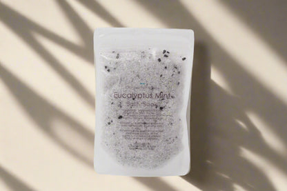 Handcrafted 5 oz botanical bath salts in heat-sealed pouches. Plant-based, aromatic blends with essential oils &amp; florals for a calming, skin-softening soak.