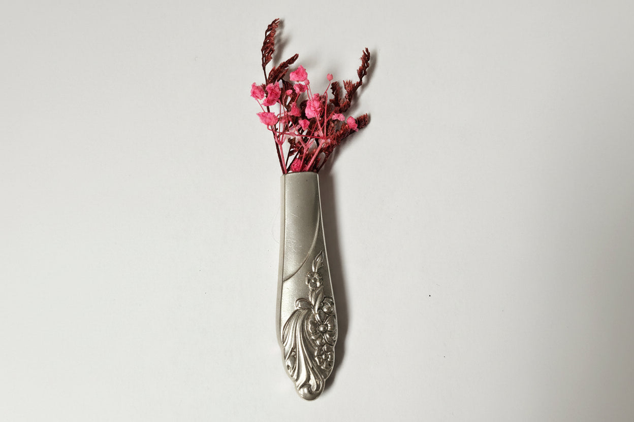 Antique silverware magnetic bud vase that sticks to fridges and metal surfaces. Holds water, one-of-a-kind vintage gift decor.