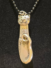Handmade silver cat pendant necklaces from vintage silverware. Elegant, whimsical, and adjustable on a satin cord. Sustainably crafted and one-of-a-kind.