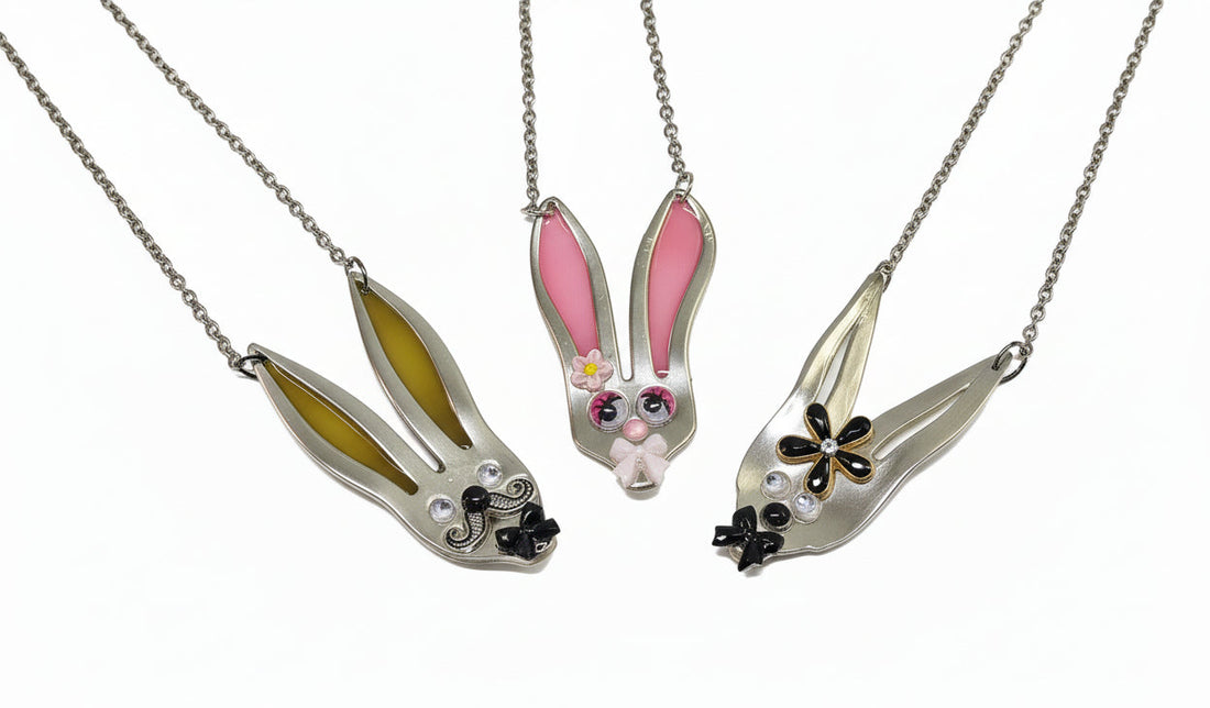 Whimsical fancy bunny pendant necklace handcrafted from vintage silverware, resin, and beads. One-of-a-kind Easter or everyday jewelry with vintage charm.