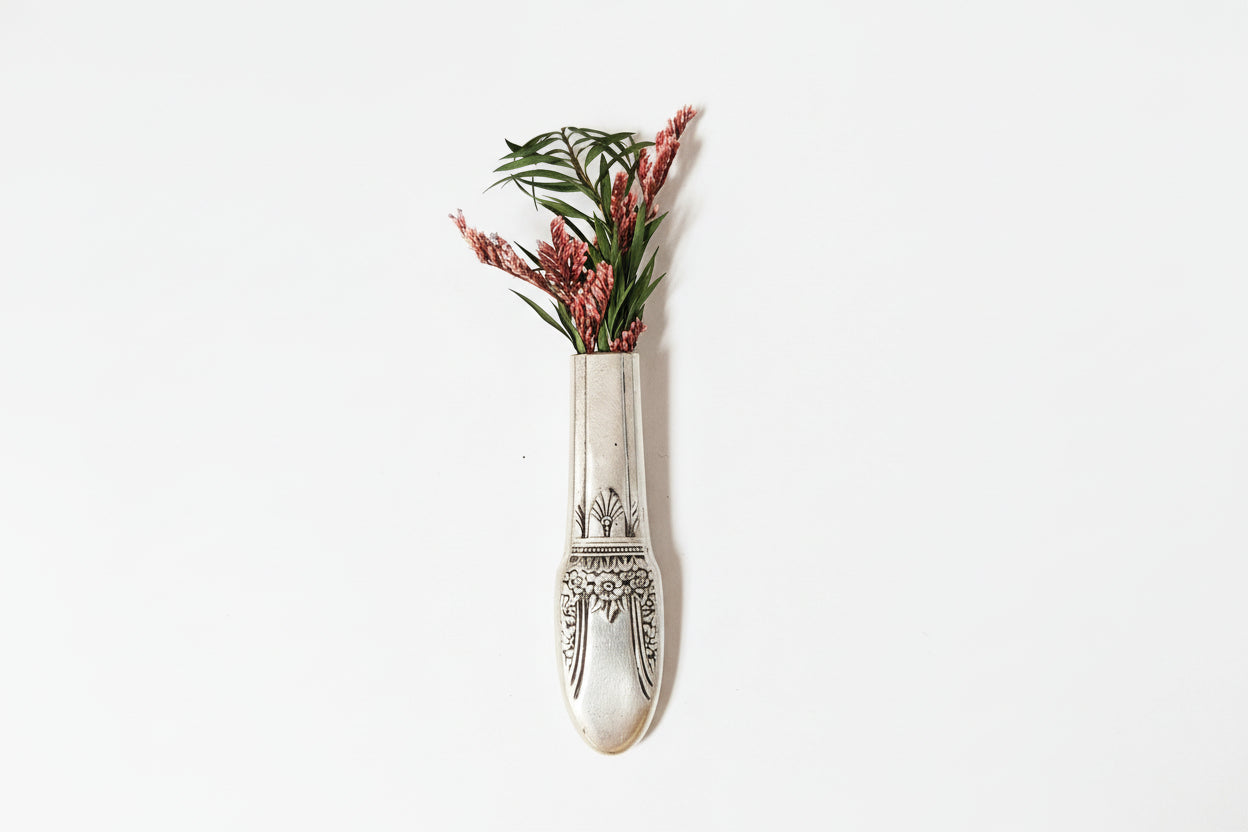 Antique silverware magnetic bud vase that sticks to fridges and metal surfaces. Holds water, one-of-a-kind vintage gift decor.
