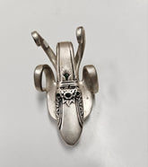 The Lucky Fork Cricket is a handcrafted sculpture made from repurposed vintage silverware, blending artistry with charm. Inspired by crickets—symbols of luck and prosperity—each piece is unique, adorned with jewels and aged patina. A perfect collectible or gift, this whimsical creation brings history, elegance, and positive energy to any space. 