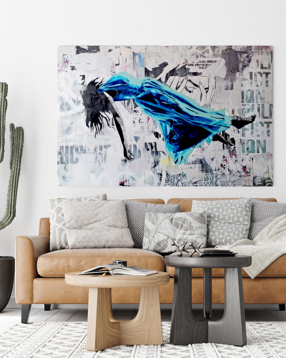 Float 5 is a 36&quot;x48&quot; mixed media artwork blending surrealism and street art. Featuring a figure floating mid-air in a blue gown against a gritty urban backdrop, it explores themes of escape and transcendence. Perfect for modern spaces, this visually striking piece adds depth and intrigue, pairing beautifully with a Palm.