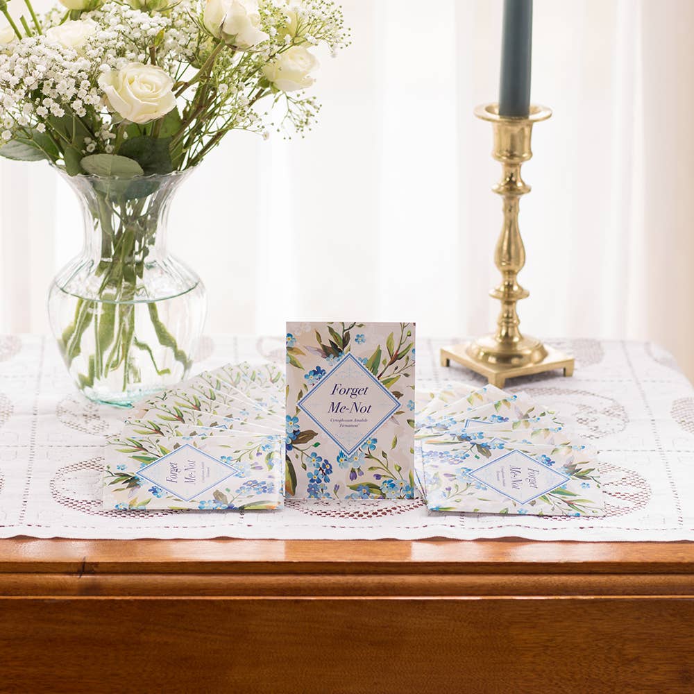 Forget-me-not flower seed packets with classic floral design. Easy-to-grow biennial blooms for memorials, favors, and meaningful garden reminders