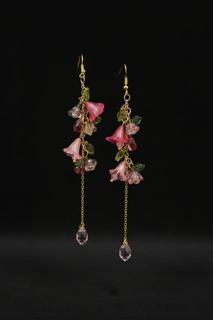 Hand-beaded Poison Garden earrings inspired by foxglove, wolfsbane, belladonna, datura, henbane and lily of the valley. Beautifully deadly botanical jewelry.