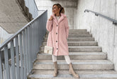 Wrap up in our Fuzzy Teddy Coat, featuring plush faux fur, a classic lapel collar, and a relaxed fit. A cozy, chic layer for fall days and winter evenings out.