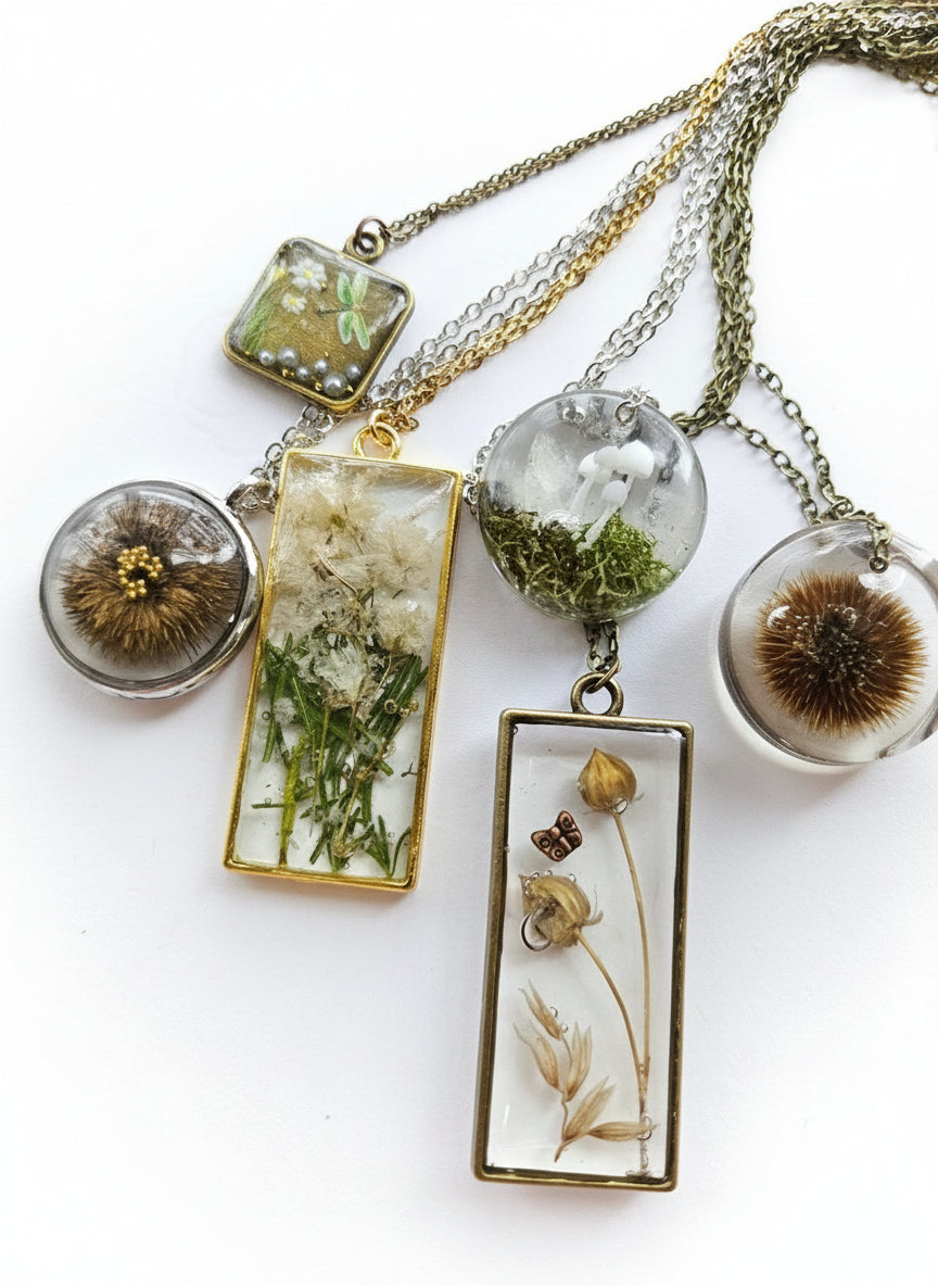 Gathered-in-the-Wild Botanical Necklace with real foraged flowers, mushrooms, pine needles, and leaves preserved in resin. Handcrafted wearable nature art by KStonely.
