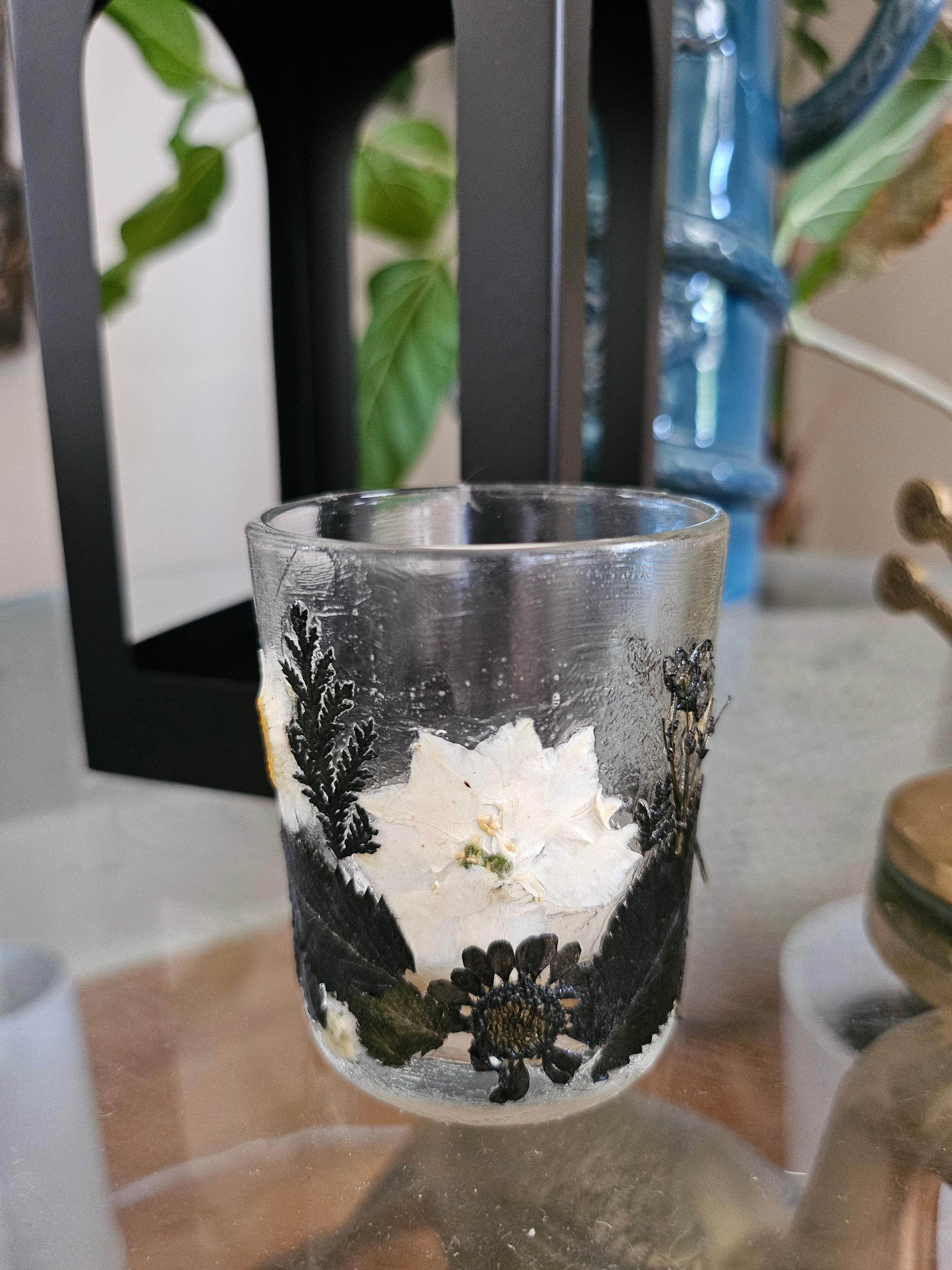 Botanical black fairy lantern with real pressed flowers and floral-scented tea lights. Perfect for witchy rituals, altars, and moody, magical spaces.