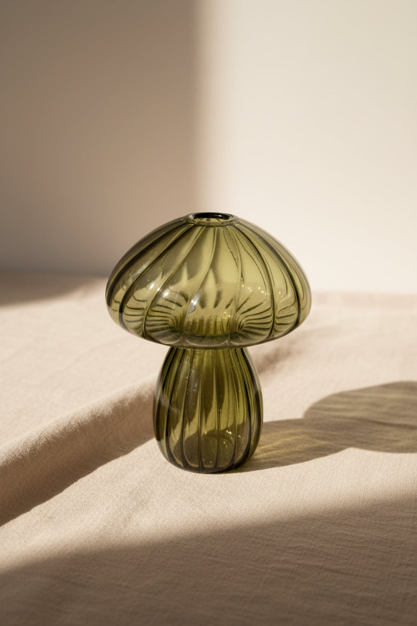 Glass mushroom propagation vase and bud vase perfect for rooting plant cuttings, displaying flowers, and adding whimsical botanical charm.