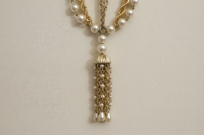 Handcrafted gold and pearl layered necklace by KStonely featuring cascading chains and tassel detail. Elegant, artistic, and truly one of a kind