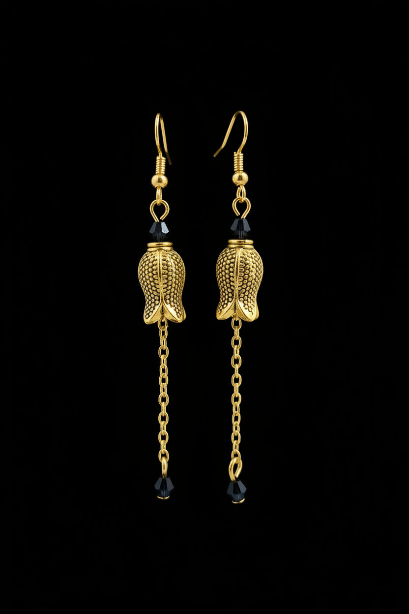 Hand-beaded Poison Garden earrings inspired by foxglove, wolfsbane, belladonna, datura, henbane and lily of the valley. Beautifully deadly botanical jewelry.