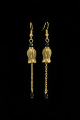 Hand-beaded Poison Garden earrings inspired by foxglove, wolfsbane, belladonna, datura, henbane and lily of the valley. Beautifully deadly botanical jewelry.
