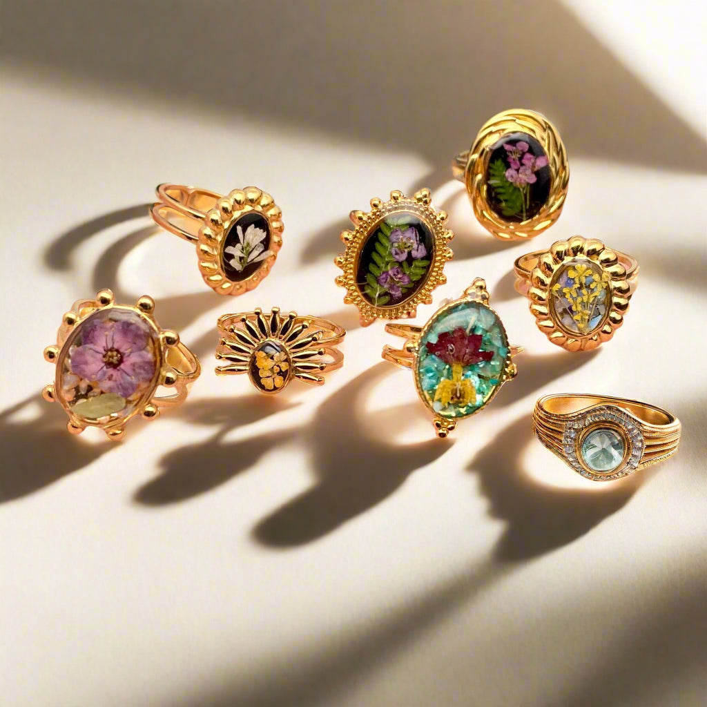 Golden Bloom Adjustable Ring with real dried flowers in resin and 18K gold-plated stainless steel. Unique, hypoallergenic, fits most, and perfect for gifting.
