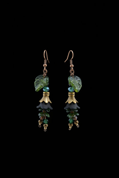 Hand-beaded Poison Garden earrings inspired by foxglove, wolfsbane, belladonna, datura, henbane and lily of the valley. Beautifully deadly botanical jewelry.
