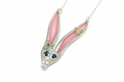 Whimsical fancy bunny pendant necklace handcrafted from vintage silverware, resin, and beads. One-of-a-kind Easter or everyday jewelry with vintage charm.