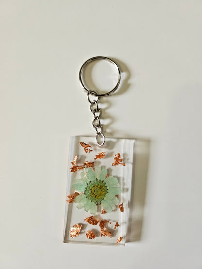 These Resin Pressed Flowers Keychains are handcrafted with real dried flowers suspended in crystal-clear resin. 