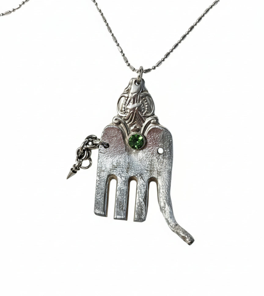 Handcrafted silver elephant pendant made from vintage silverware. Symbolizes strength, wisdom &amp; luck. Eco-friendly, one-of-a-kind, and artisan-made in the USA.