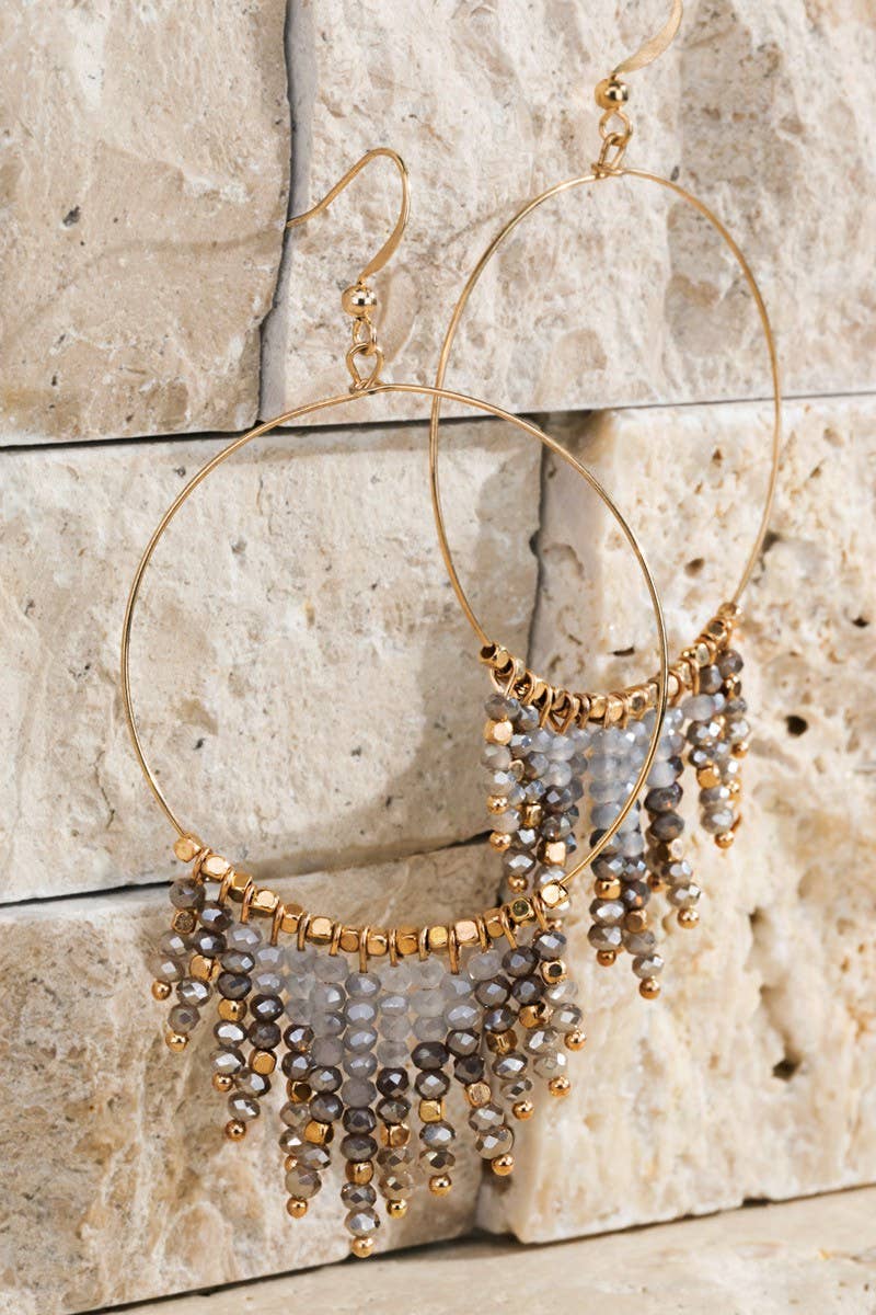 Shimmering beaded tassel chandelier earrings with a lightweight metal ring, hypoallergenic fish hooks, and dazzling glass beads—perfect for any occasion! 