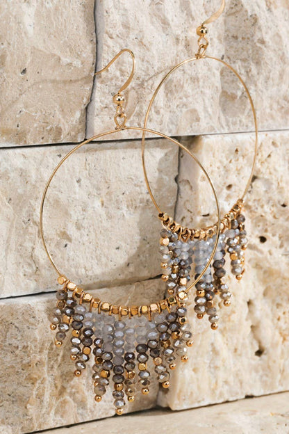 Shimmering beaded tassel chandelier earrings with a lightweight metal ring, hypoallergenic fish hooks, and dazzling glass beads—perfect for any occasion! 