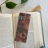 Hand-illustrated "Cozy Hobbit Nook" bookmark on premium textured paper. A perfect literary escape for fantasy lovers and cozy reading moments