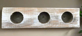 Handcrafted cedar wood planter with a rustic, weathered finish. Lightweight 3-hole design for air plants or succulents. Indoor décor only. Plants not included.