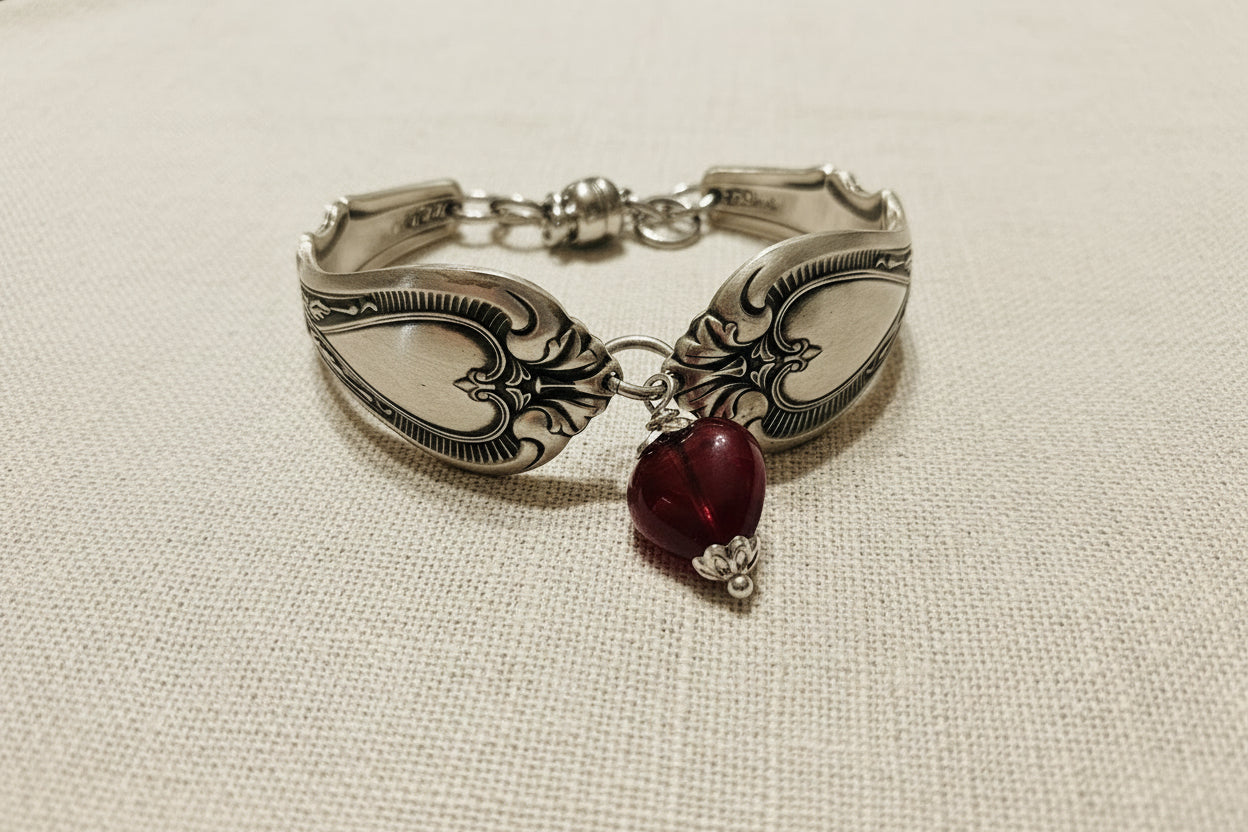 Handcrafted Sweetheart pattern bracelet made from highly collectible Chase Silver Company silverware, sustainably repurposed with a heart detail.