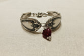 Handcrafted Sweetheart pattern bracelet made from highly collectible Chase Silver Company silverware, sustainably repurposed with a heart detail.