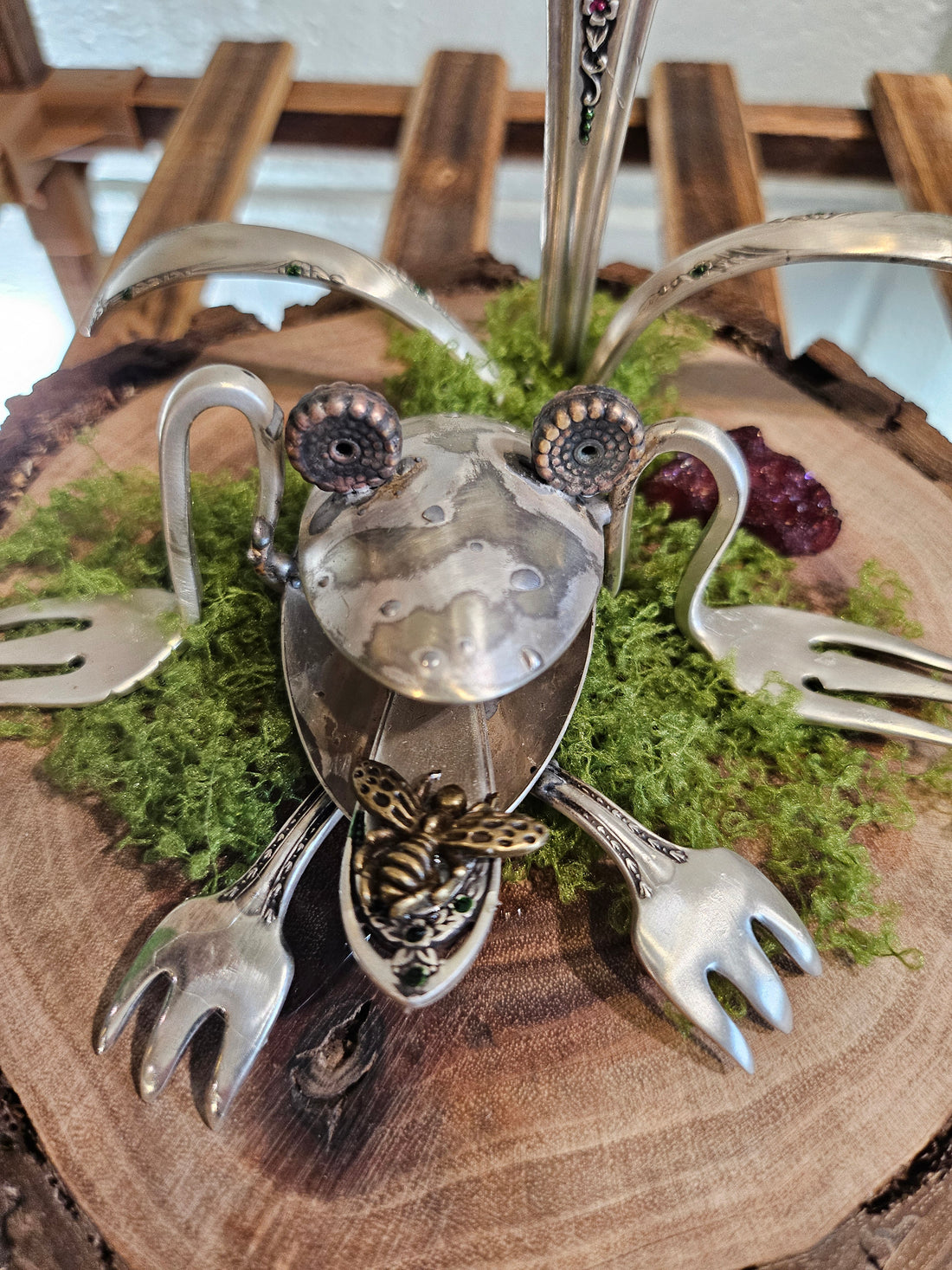 Handcrafted frog sculpture from vintage silverware, set on walnut wood with moss and crystals. A whimsical, one-of-a-kind piece for home or garden décor.