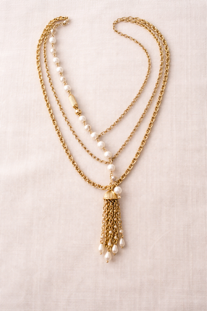 Handcrafted gold and pearl layered necklace by KStonely featuring cascading chains and tassel detail. Elegant, artistic, and truly one of a kind