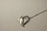 Handcrafted heart pendant made from vintage silverware. A unique, eco-friendly symbol of love—artisan-made in the USA and perfect for gifting or everyday wear.