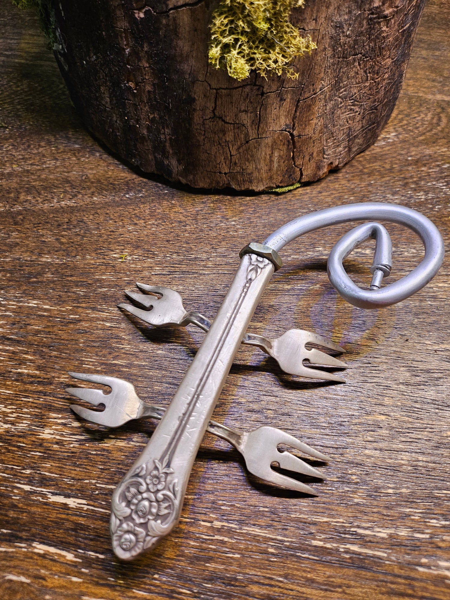 Handcrafted lizard sculpture made from vintage silverware. A whimsical, one-of-a-kind art piece symbolizing luck, renewal, and sun-loving charm.