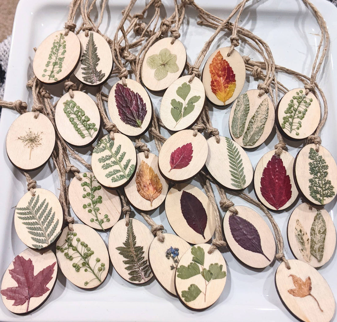Handcrafted wood ornaments with real flowers or leaves. Each unique piece adds natural charm to holiday trees, gifts, or year-round home décor.