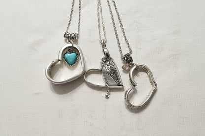 Handcrafted heart pendant made from vintage silverware. A unique, eco-friendly symbol of love—artisan-made in the USA and perfect for gifting or everyday wear.