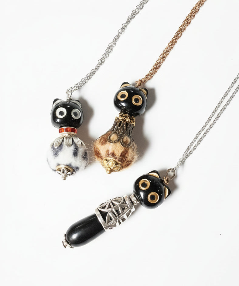 Handmade Cat Bead Necklaces by KStonely. Each one-of-a-kind artisan necklace features whimsical cat beads, unique accents, and vintage-inspired charm.
