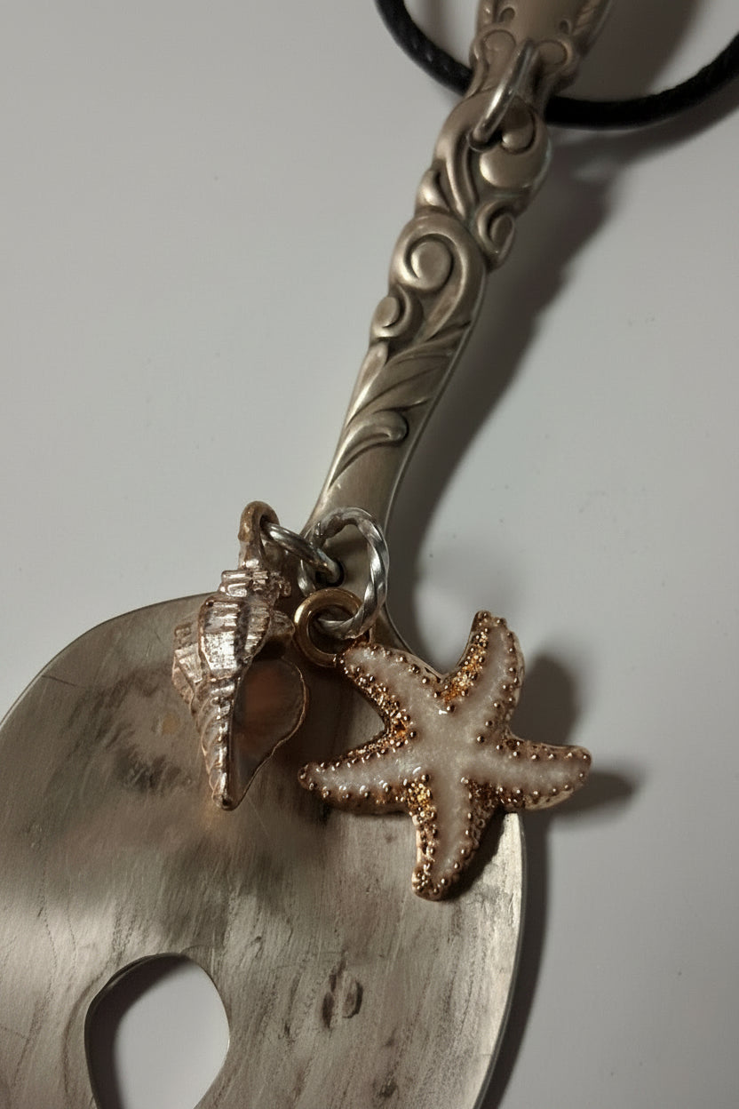 Handmade mermaid tail pendant crafted from vintage silverware