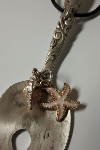 Handmade mermaid tail pendant crafted from vintage silverware