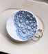 Handmade polymer clay dish with a green lace impression. Perfect as a jewelry or ring holder. Durable, decorative, and one-of-a-kind. Not food safe.